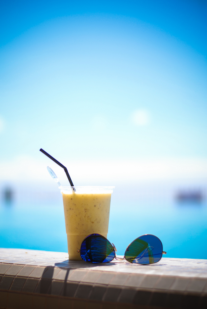 tropical drink sunglasses pool